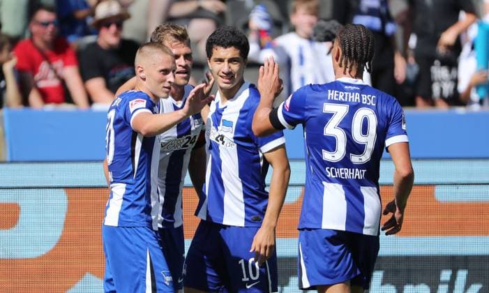 Florian Niederlechner cheers after 2 0 with Palko Dardai, Ibrahim Maza, Derry Scherhant Joy Emotion Jubilation Sport Soccer Football DFL 2 Bundesliga Men 3 Matchday Season 2024 2025 24 08 2024 Hertha BSC Berlin vs SSV Jahn Regensburg DFL regulations prohibit any use of photographs as image sequences and or quasi video
