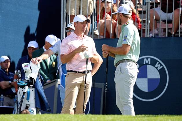 CASTLE ROCK, CO - AUGUST 24: PGA, Golf Herren golfers Rory McIlroy and Sam Burns talk while waiting on the first tee during the third round of the PGA FedExCup BMW Championship on August 24th, 2024, at Castle Pines Golf Club in Castle Rock, Colorado. (Photo by Brian Spurlock Icon Sportswire) GOLF: AUG 24 PGA FedExCup Playoffs - BMW Championship EDITORIAL USE ONLY Icon24082414