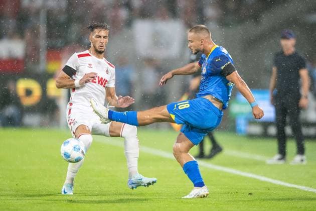 24 08 2024, Soccer 2 Bundesliga, Season 2024 2025, Matchday 03, 1 FC Koeln vs Eintracht Braunschweig at Rhein Energie Stadium in Koeln duel between Leart Pacarada 1 FC Koeln, 17 and Marvin Rittmueller Eintracht Braunschweig, 18 Important note In accordance with the regulations of the DFL German Football League and the DFB German Football Association, it is prohibited to utilize or have utilized photographs taken in the stadium and or of the match in the form of sequential images and or video-like photo series Foto Kirchner Media TH Copyright: xKirchner-Media THx