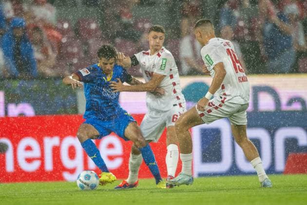 24 08 2024, Soccer 2 Bundesliga, Season 2024 2025, Matchday 03, 1 FC Koeln vs Eintracht Braunschweig at Rhein Energie Stadium in Koeln duel between Eric Martel 1 FC Koeln, 06 , Walid Ould Chikh Eintracht Braunschweig, 10 and Tim Lemperle 1 FC Koeln, 19 Important note In accordance with the regulations of the DFL German Football League and the DFB German Football Association, it is prohibited to utilize or have utilized photographs taken in the stadium and or of the match in the form of sequential images and or video-like photo series Foto Kirchner Media TH Copyright: xKirchner-Media THx