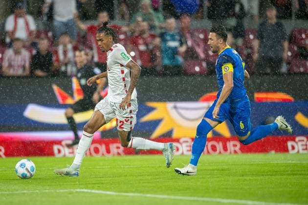 24 08 2024, Soccer 2 Bundesliga, Season 2024 2025, 03 Matchday, 1 FC Koeln vs Eintracht Braunschweig at Rhein Energie Stadium in Koeln duel between Damion Downs 1 FC Koeln, 42 and Ermin Bicakcic Eintracht Braunschweig, 06 Important note In accordance with the regulations of the DFL German Football League and the DFB German Football Association, it is prohibited to utilize or have utilized photographs taken in the stadium and or of the match in the form of sequential images and or video-like photo series Foto Kirchner Media TH Copyright: xKirchner-Media THx
