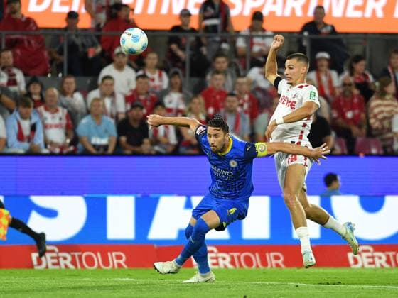 24 08 2024, Cologne, Germany, Rhein Energie Stadium, 1 FC Koeln vs Eintracht Braunschweig 2 Bundesliga, Ermin Bicakcic Eintracht Braunschweig and Tim Lemperle 1 FC Koeln in duel Photo Ralf Treese DFB DFL REGULATIONS PROHIBIT ANY USE OF PHOTOGRAPHS AS IMAGE SEQUENCES AND OR QUASI VIDEO Cologne Rhein Energie Stadium North Rhine Westphalia Germany 521_KOEBRA20240824_028 Treese-521