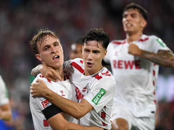 24 08 2024, Cologne, Germany, Rhein Energie Stadium, 1 FC Koeln vs Eintracht Braunschweig 2 Bundesliga, Timo Huebers 1 FC Koeln and Denis Huseinbasic 1 FC Koeln goal celebration, cheers with his team after scoring 1 0 Photo Ralf Treese DFB DFL REGULATIONS PROHIBIT ANY USE OF PHOTOGRAPHS AS IMAGE SEQUENCES AND OR QUASI VIDEO Cologne Rhein Energie Stadium North Rhine Westphalia Germany 521_KOEBRA20240824_037 Treese-521