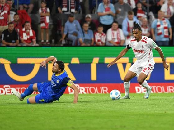 Cologne, Germany, 24 08 24 Ermin Bicakcic Eintracht Braunschweig and Damion Downs 1 FC Koeln battle for the ball during the 2 Bundesliga match between 1 FC Koeln vs Eintracht Braunschweig at Rhein Energie Stadion on August 24, 2024 in Cologne, Germany Photo by Ralf Treese DeFodi Images Cologne, Germany, 24 08 24 Ermin Bicakcic Eintracht Braunschweig and Damion Downs 1 FC Koeln battle for the ball during the 2 Bundesliga match between 1 FC Koeln vs Eintracht Braunschweig at Rhein Energie Stadium on August 24, 2024 in Cologne, Germany Photo by Ralf Treese DeFodi Images DFB DFL REGULATIONS PROHIBIT ANY USE OF PHOTOGRAPHS AS IMAGE SEQUENCES AND OR QUASI VIDEO Defodi 521 KOEBRA20240824 033 Defodi-521 DFB DFL REGULATIONS PROHIBIT ANY USE OF PHOTOGRAPHS AS IMAGE SEQUENCES AND OR QUASI-VIDEO.