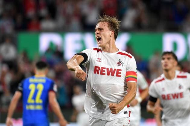 Koeln, Germany, 24 08 24 Timo Huebers 1 FC Koeln celebrates after scoring his team™s first goal during the 2 Bundesliga match between 1 FC Koeln vs Eintracht Braunschweig at Rhein Energie Stadium on August 24, 2024 in Koeln, Germany Photo by Ralf Treese DeFodi Images Cologne, Germany, 24 08 24 Timo Huebers 1 FC Koeln celebrates after scoring his team™s first goal during the 2 Bundesliga match between 1 FC Koeln vs Eintracht Braunschweig at Rhein Energie Stadium on August 24, 2024 in Cologne, Germany Photo by Ralf Treese DeFodi Images DFB DFL REGULATIONS PROHIBIT ANY USE OF PHOTOGRAPHS AS IMAGE SEQUENCES AND OR QUASI VIDEO Defodi 521 KOEBRA20240824 035 Defodi-521 DFB DFL REGULATIONS PROHIBIT ANY USE OF PHOTOGRAPHS AS IMAGE SEQUENCES AND OR QUASI-VIDEO.