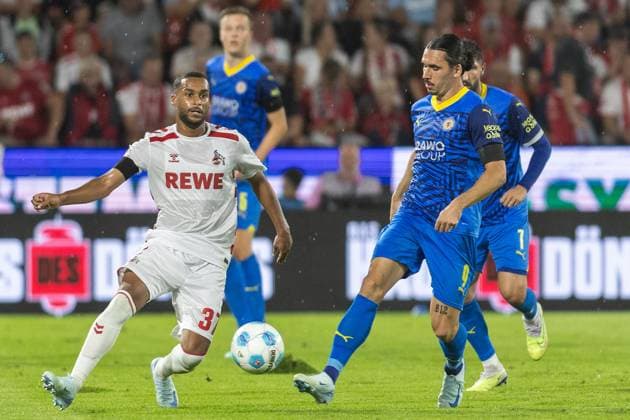 Soccer 2 Liga 1 FC Köln Eintracht Braunschweig on 24 08 2024 at RheinEnergieStadion in Cologne Linton Maina Köln , left Rayan Philippe Braunschweig , right DFB regulations prohibit any use of photographs as image sequences and or quasi video xJRx