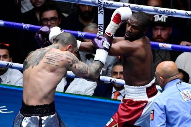 August 24, 2024, Mexico City, Ciudad de Mexico, Mexico: Boxer Floyd Mayweather Jr. of United States and boxer John Gotti III of United States exchange punches during an exhibition fight at Arena Ciudad de Mexico. Mexico City Mexico - ZUMAe321 20240824_zsa_e321_001 Copyright: xCarlosxTischler xEyepixxGroupx
