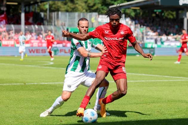 Jorrit Hendrix SC Preussen Muenster and Dickson Abiama 1 FC Kaiserslautern battle for the ball, 2 Bundesliga, Preußen Münster vs 1 FC Kaiserslautern, Preußenstadion, August 24, 2024 in Münster, Germany Photo by Marco Steinbrenner DeFodi Images Jorrit Hendrix SC Preussen Muenster and Dickson Abiama 1 FC Kaiserslautern battle for the ball, 2 Bundesliga, Preußen Münster vs 1 FC Kaiserslautern, Preußenstadion, August 24, 2024 in Münster, Germany Photo by Marco Steinbrenner DeFodi Images DFB DFL REGULATIONS PROHIBIT ANY USE OF PHOTOGRAPHS AS IMAGE SEQUENCES AND OR QUASI VIDEO Defodi 700 scp fcK 20240824 150 Defodi-700 DFB DFL REGULATIONS PROHIBIT ANY USE OF PHOTOGRAPHS AS IMAGE SEQUENCES AND OR QUASI-VIDEO.