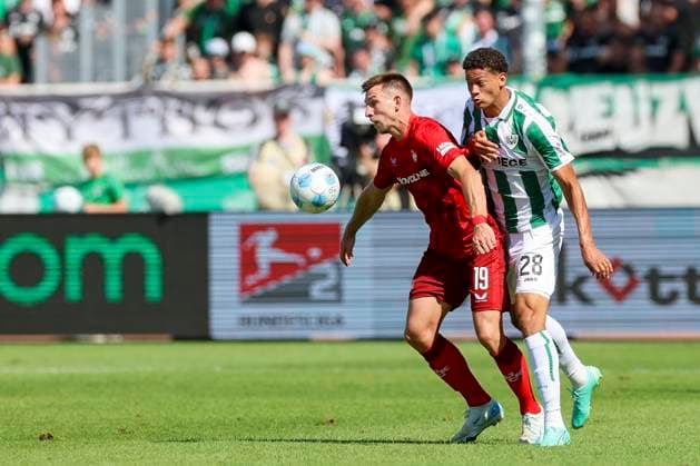 Daniel Hanslik 1 FC Kaiserslautern and Andras Nemeth SC Preussen Muenster battle for the ball, 2 Bundesliga, Preußen Münster vs 1 FC Kaiserslautern, Preußenstadion, August 24, 2024 in Münster, Germany Photo by Marco Steinbrenner DeFodi Images Daniel Hanslik 1 FC Kaiserslautern and Andras Nemeth SC Preussen Muenster battle for the ball, 2 Bundesliga, Preußen Münster vs 1 FC Kaiserslautern, Preußenstadion, August 24, 2024 in Münster, Germany Photo by Marco Steinbrenner DeFodi Images DFB DFL REGULATIONS PROHIBIT ANY USE OF PHOTOGRAPHS AS IMAGE SEQUENCES AND OR QUASI VIDEO Defodi 700 scp fcK 20240824 190 Defodi-700 DFB DFL REGULATIONS PROHIBIT ANY USE OF PHOTOGRAPHS AS IMAGE SEQUENCES AND OR QUASI-VIDEO.