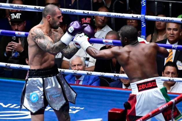 August 24, 2024, Mexico City, Ciudad de Mexico, Mexico: Boxer Floyd Mayweather Jr. of United States and boxer John Gotti III of United States exchange punches during an exhibition fight at Arena Ciudad de Mexico. Mexico City Mexico - ZUMAe321 20240824_zsa_e321_026 Copyright: xCarlosxTischler xEyepixxGroupx