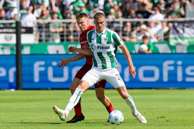 Tobias Raschl 1 FC Kaiserslautern and Luca Bazzoli SC Preussen Muenster battle for the ball, 2 Bundesliga, Preußen Münster vs 1 FC Kaiserslautern, Preußenstadion, August 24, 2024 in Münster, Germany Photo by Marco Steinbrenner DeFodi Images Tobias Raschl 1 FC Kaiserslautern and Luca Bazzoli SC Preussen Muenster battle for the ball, 2 Bundesliga, Preußen Münster vs 1 FC Kaiserslautern, Preußenstadion, August 24, 2024 in Münster, Germany Photo by Marco Steinbrenner DeFodi Images DFB DFL REGULATIONS PROHIBIT ANY USE OF PHOTOGRAPHS AS IMAGE SEQUENCES AND OR QUASI VIDEO Defodi 700 scp fcK 20240824 197 Defodi-700 DFB DFL REGULATIONS PROHIBIT ANY USE OF PHOTOGRAPHS AS IMAGE SEQUENCES AND OR QUASI-VIDEO.