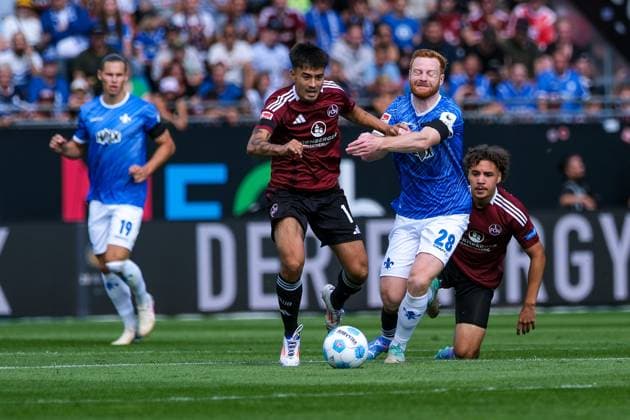 Jens Castrop 1 FC Nuernberg, 17 in duel with Paul Will SV Darmstadt 98, 28 , GER, SV Darmstadt 98 vs 1 FC Nuernberg, Soccer, 2 Bundesliga, Matchday 3, Season 2024 2025, 25 08 2024 DFL REGULATIONS PROHIBIT ANY USE OF PHOTOGRAPHS as IMAGE SEQUENCES and or QUASI VIDEO GER, SV Darmstadt 98 vs 1 FC Nuernberg Soccer, 2 Bundesliga, Matchday 3, Season 2024 2025, 25 08 2024 Darmstadt Copyright: xEibner-Pressefoto FlorianxWieganx EP_FWD