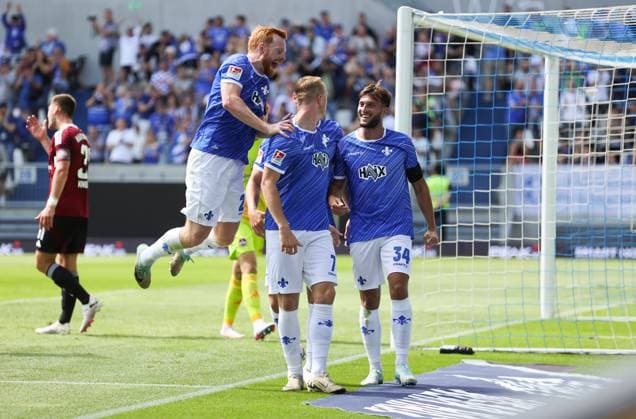 25 08 2024, xdcx, Soccer 2 Bundesliga, SV Darmstadt 98 1 FC Nürnberg, emonline, emspor, despor, v l , Goal celebration, celebrate the goal DFL DFB REGULATIONS PROHIBIT ANY USE OF PHOTOGRAPHS AS IMAGE SEQUENCES AND OR QUASI VIDEO Copyright: HMBxMedia Claus