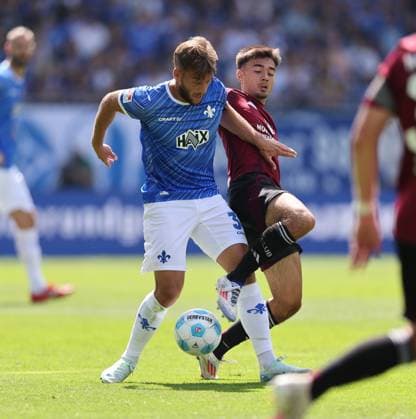 25 08 2024, xdcx, Soccer 2 Bundesliga, SV Darmstadt 98 1 FC Nürnberg, emonline, emspor, despor, v l , Killian Corredor SV Darmstadt 98 , Jens Castrop 1 FC Nürnberg DFL DFB REGULATIONS PROHIBIT ANY USE OF PHOTOGRAPHS AS IMAGE SEQUENCES AND OR QUASI VIDEO Copyright: HMBxMedia Claus