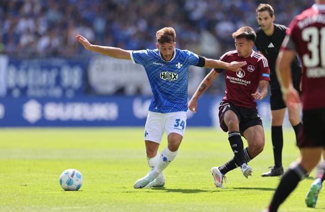 25 08 2024, xdcx, Soccer 2 Bundesliga, SV Darmstadt 98 1 FC Nürnberg, emonline, emspor, despor, v l , Killian Corredor SV Darmstadt 98 , Jens Castrop 1 FC Nürnberg DFL DFB REGULATIONS PROHIBIT ANY USE OF PHOTOGRAPHS AS IMAGE SEQUENCES AND OR QUASI VIDEO Copyright: HMBxMedia Claus