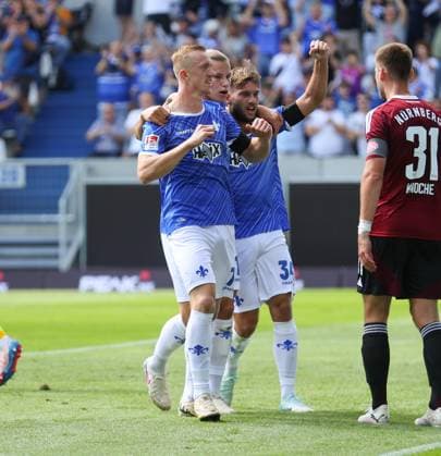 25 08 2024, xdcx, Soccer 2 Bundesliga, SV Darmstadt 98 1 FC Nürnberg, emonline, emspor, despor, v l , Goal celebration, celebrate the goal DFL DFB REGULATIONS PROHIBIT ANY USE OF PHOTOGRAPHS AS IMAGE SEQUENCES AND OR QUASI VIDEO Copyright: HMBxMedia Claus