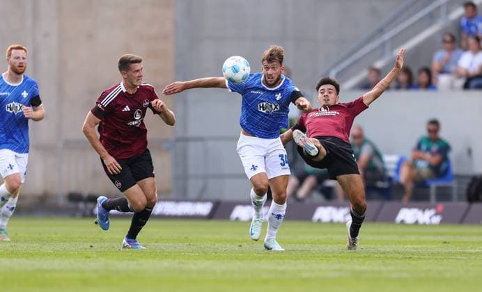 25 08 2024, xdcx, Soccer 2 Bundesliga, SV Darmstadt 98 1 FC Nürnberg, emonline, emspor, despor, v l , Florian Flick 1 FC Nürnberg , Killian Corredor SV Darmstadt 98 , Jens Castrop 1 FC Nürnberg DFL DFB REGULATIONS PROHIBIT ANY USE OF PHOTOGRAPHS AS IMAGE SEQUENCES AND OR QUASI VIDEO Copyright: HMBxMedia Claus