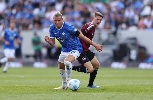 25 08 2024, xdcx, Soccer 2 Bundesliga, SV Darmstadt 98 1 FC Nürnberg, emonline, emspor, despor, v l , Fynn Lakenmacher SV Darmstadt 98 , Florian Flick 1 FC Nürnberg DFL DFB REGULATIONS PROHIBIT ANY USE OF PHOTOGRAPHS AS IMAGE SEQUENCES AND OR QUASI VIDEO Copyright: HMBxMedia Claus