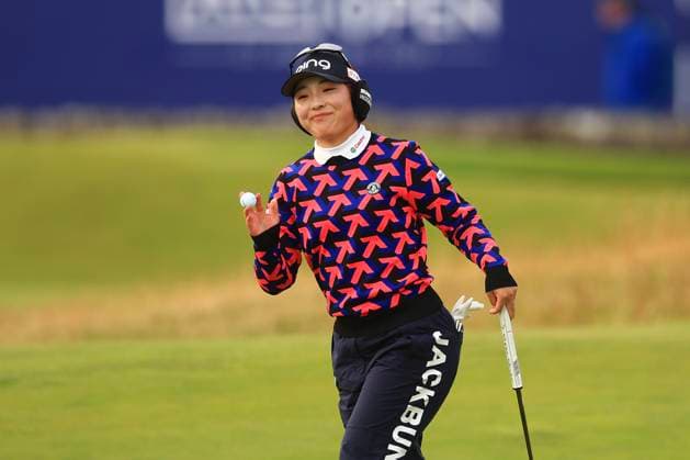 25th August 2024; Old Course at St Andrews, St Andrews, Fife, Scotland; AIG Womens Open Golf, Final Round; Shuri Sakura of Japan acknowledges the applause after holing a birdie putt on the first hole of the Old Course, St Andrews Links during the final round of the AIG Women& x2019;s Open  ActionPlus12685863 DavidxYoung