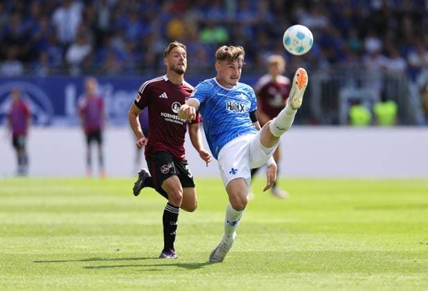 25 08 2024, xdcx, Soccer 2 Bundesliga, SV Darmstadt 98 1 FC Nürnberg, emonline, emspor, despor, v l , Lukas Schleimer 1 FC Nürnberg , Matej Maglica SV Darmstadt 98 DFL DFB REGULATIONS PROHIBIT ANY USE OF PHOTOGRAPHS AS IMAGE SEQUENCES AND OR QUASI VIDEO Copyright: HMBxMedia Claus