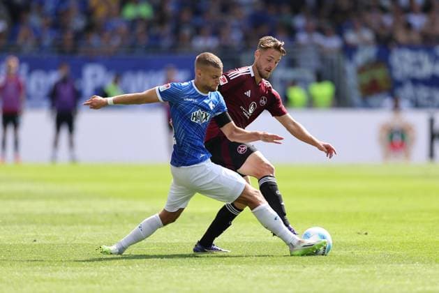 25 08 2024, xdcx, Soccer 2 Bundesliga, SV Darmstadt 98 1 FC Nürnberg, emonline, emspor, despor, v l , Fabian Nürnberger SV Darmstadt 98 , Lukas Schleimer 1 FC Nürnberg DFL DFB REGULATIONS PROHIBIT ANY USE OF PHOTOGRAPHS AS IMAGE SEQUENCES AND OR QUASI VIDEO Copyright: HMBxMedia Claus