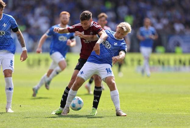 25 08 2024, xdcx, Soccer 2 Bundesliga, SV Darmstadt 98 1 FC Nürnberg, emonline, emspor, despor, v l , Stefanos Tzimas 1 FC Nürnberg , Andreas Müller SV Darmstadt 98 DFL DFB REGULATIONS PROHIBIT ANY USE OF PHOTOGRAPHS AS IMAGE SEQUENCES AND OR QUASI VIDEO Copyright: HMBxMedia Claus
