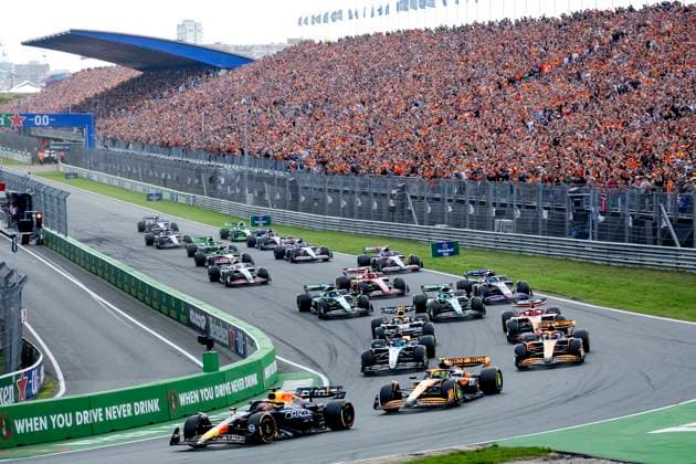 ZANDVOORT - Max Verstappen (Red Bull Racing) in the lead at the start, with Lando Norris (McLaren) behind him during the F1 Grand Prix of the Netherlands at the Circuit of Zandvoort. ANP SEM VAN DER WAL xVIxANPxSportx xxANPxIVx 506720891 originalFilename: 506720891.jpg