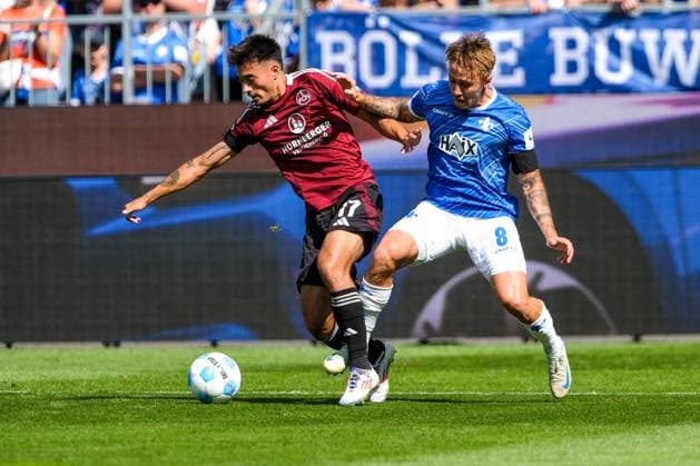 Jens Castrop 1 FC Nuernberg, 17 in duel with Luca Marseiler SV Darmstadt 98, 08 , GER, SV Darmstadt 98 vs 1 FC Nuernberg, Football, 2 Bundesliga, Matchday 3, Season 2024 2025, 25 08 2024 DFL REGULATIONS PROHIBIT ANY USE OF PHOTOGRAPHS as IMAGE SEQUENCES and or QUASI VIDEO GER, SV Darmstadt 98 vs 1 FC Nuernberg Football, 2 Bundesliga, Matchday 3, Season 2024 2025, 25 08 2024 Darmstadt Copyright: xEibner-Pressefoto FlorianxWieganx EP_FWD