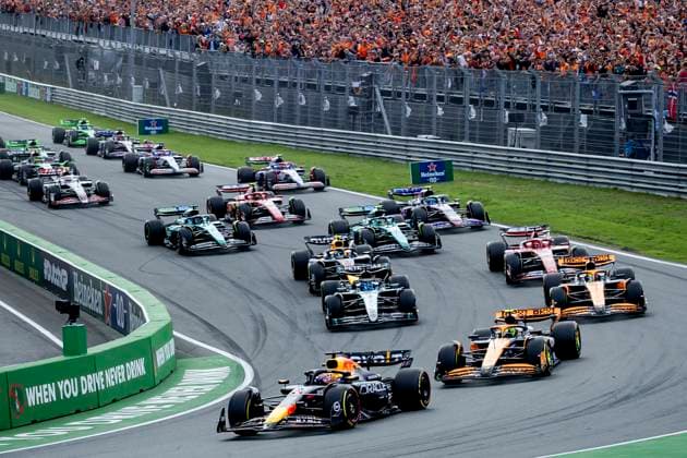 ZANDVOORT - Max Verstappen (Red Bull Racing) in the lead at the start, with Lando Norris (McLaren) behind him during the F1 Grand Prix of the Netherlands at the Circuit of Zandvoort. ANP SEM VAN DER WAL xVIxANPxSportx xxANPxIVx 506720986 originalFilename: 506720986.jpg