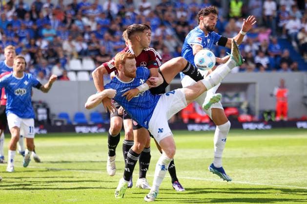 2024 08 25 xJFAx Soccer 2 Bundesliga 3 Matchday Season 2024 25, SV Darmstadt 98 1 FC Nürnberg v l , Stefanos Tzimas 1 FC Nürnberg , Paul Will SV Darmstadt 98 , Zweikampf, Action, Aktion, Battles for the Ball DFL DFB REGULATIONS PROHIBIT ANY USE OF PHOTOGRAPHS as IMAGE SEQUENCES and or QUASI VIDEO Copyright: JoaquimxFerreira