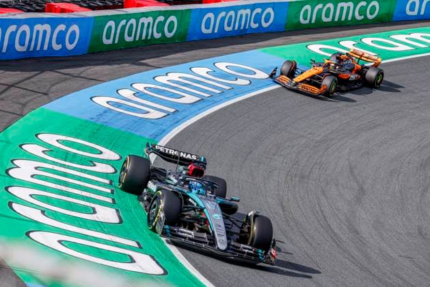 George Russell of Great Britain and Mercedes AMG Petronas F1 Team and Oscar Piastri of Australia and McLaren Formula 1 Team during the F1 Grand Prix of Netherlands at Circuit Park Zandvoort on August 25, 2024 in Zandvoort, Netherlands Defodi 704 MTB20240825F1MTBPhoto 7868 Defodi-704