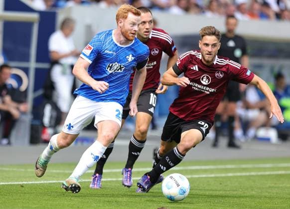 25 08 2024 Soccer Season 2024 2025 2 Soccer Bundesliga 03 Matchday SV Darmstadt 98 SVD D98 Lilien 1 FC Nürnberg FCN Club Sportfoto Zink DaMa xdaxmax DFL regulations prohibit any use of photographs as image sequences and or quasi video only for editorial use Paul Will 28, SV Darmstadt 98 D98 SV98 Julian Justvan 10, 1 FC Nürnberg FCN Lukas Schleimer 36, 1 FC Nürnberg FCN