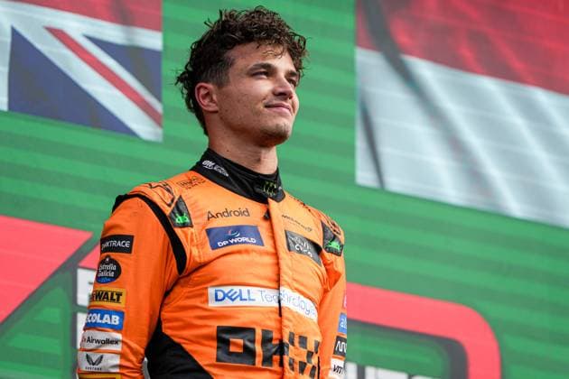 2024-08-25 F1 - Heineken Dutch GP - Trophy Ceremony ZANDVOORT, NETHERLANDS - AUGUST 25: Lando Norris of McLaren looks up after coming in first place at the Trophy Ceremony during F1 - Heineken Dutch GP on August 25, 2024 in Zandvoort, Netherlands. Zandvoort Netherlands Content not available for redistribution in The Netherlands directly or indirectly through any third parties. Copyright: xAndrexWeeningx