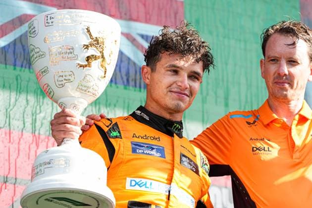 2024-08-25 F1 - Heineken Dutch GP - Trophy Ceremony ZANDVOORT, NETHERLANDS - AUGUST 25: Lando Norris of McLaren raises the trophy at the Trophy Ceremony during F1 - Heineken Dutch GP on August 25, 2024 in Zandvoort, Netherlands. Zandvoort Netherlands Content not available for redistribution in The Netherlands directly or indirectly through any third parties. Copyright: xAndrexWeeningx