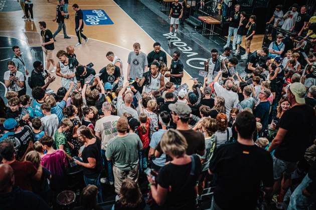 Basketball Men Season 2024 2025 easyCredit Basketball Bundesliga Test match Veolia Towers Hamburg vs EWE Baskets Oldenburg 25 08 2024 Towers sign autographs for fans after the match Hamburg Inselpark Arena Hamburg Germany