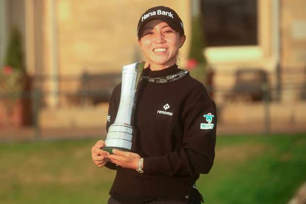 25th August 2024; Old Course at St Andrews, St Andrews, Fife, Scotland; AIG Womens Open Golf, Final Round; Lydia Ko of New Zealand with the AIG Womens Open trophy in front of the R&amp;A clubhouse after her round of 69 had secured the win  ActionPlus12686256 DavidxYoung
