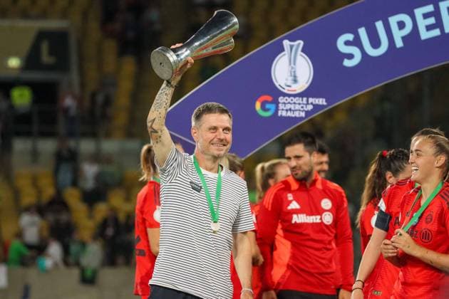 Dresden, Germany August 25, 2024 Supercup Women 2024 2025 VfL Wolfsburg vs 1 FC Bayern Munich In picture coach Alexander Straus FCB with Supercup trophy in hand DFB regulations prohibit any use of photographs as image sequences and or quasi video Rudolf Harbig Stadion Sachsen Copyright: xFotostandx xFantinix