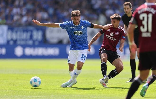 25 08 2024, xdcx, Soccer 2 Bundesliga, SV Darmstadt 98 1 FC Nürnberg, emonline, emspor, despor, v l , Killian Corredor SV Darmstadt 98 , Jens Castrop 1 FC Nürnberg DFL DFB REGULATIONS PROHIBIT ANY USE OF PHOTOGRAPHS AS IMAGE SEQUENCES AND OR QUASI VIDEO Copyright: HMBxMedia Claus