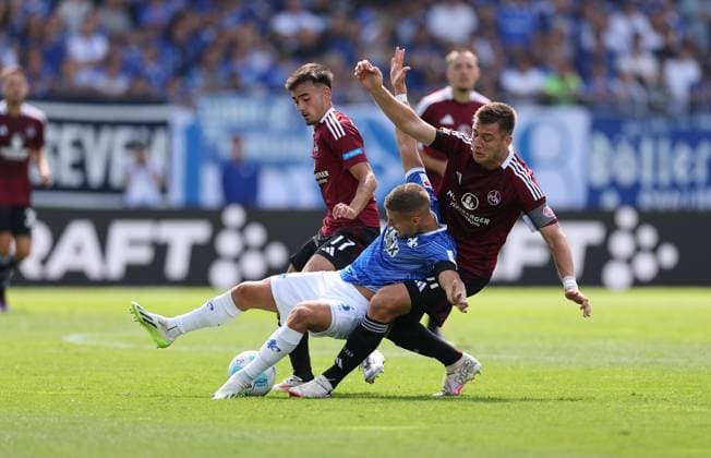25 08 2024, xdcx, Soccer 2 Bundesliga, SV Darmstadt 98 1 FC Nürnberg, emonline, emspor, despor, v l , Jens Castrop 1 FC Nürnberg , Fabian Nürnberger SV Darmstadt 98 , Robin Knoche 1 FC Nürnberg DFL DFB REGULATIONS PROHIBIT ANY USE OF PHOTOGRAPHS AS IMAGE SEQUENCES AND OR QUASI VIDEO Copyright: HMBxMedia Claus