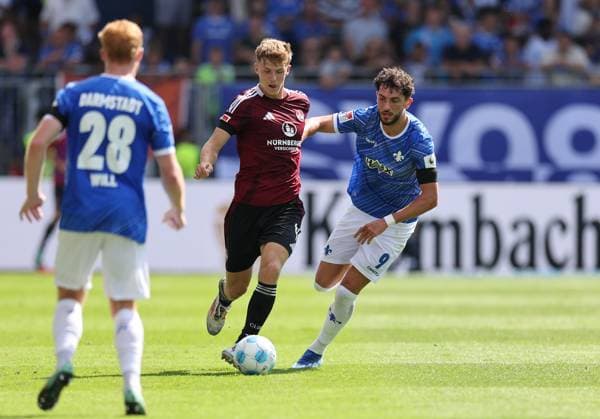 25 08 2024, xdcx, Soccer 2 Bundesliga, SV Darmstadt 98 1 FC Nürnberg, emonline, emspor, despor, v l , Finn Jeltsch 1 FC Nürnberg , Fraser Hornby SV Darmstadt 98 DFL DFB REGULATIONS PROHIBIT ANY USE OF PHOTOGRAPHS AS IMAGE SEQUENCES AND OR QUASI VIDEO Copyright: HMBxMedia Claus