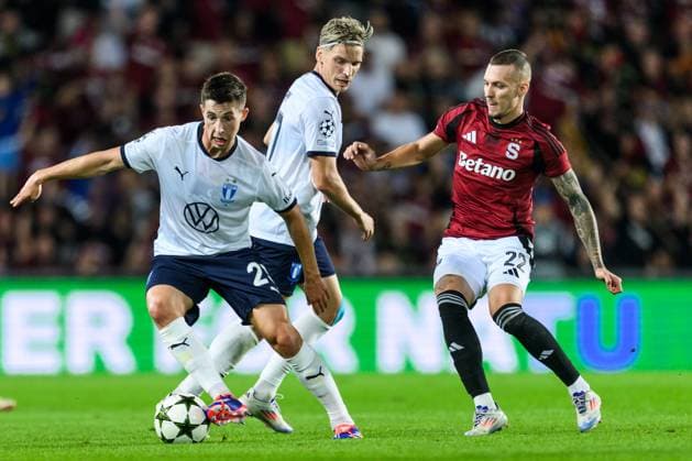 240827 Lasse Berg Johnsen and Jens Stryger Larsen of Malmö FF and Lukas Haraslin of Sparta Prague during the UEFA Champions League football match between Sparta Prague and Malmö FF on August 27, 2024 in Prague Photo Mathilda Ahlberg BILDBYRAN kod MA MA0710 fotboll football soccer fotball champions league sparta prag malmö ff bbeng bbauto  Copyright: MATHILDAxAHLBERG BB240827MA082