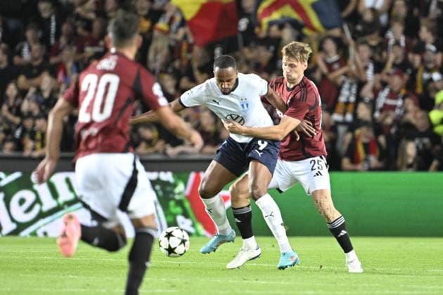 From left Isaac Kiese Thelin of Malmo and Asger Sorensen of Sparta during the Football Champions League 4th qualifying round Return match: Sparta Prague vs Malmo FF in Prague, Czech Republic, August 27, 2024. (CTKxPhoto KaterinaxSulova) CTKPhotoP2024082707157  CTKPhotoP2024082707157