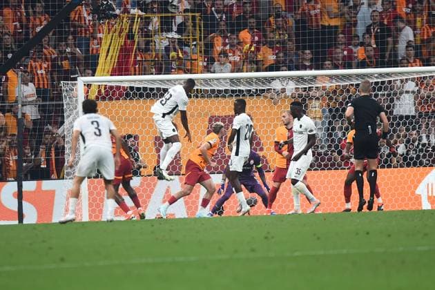 Baris Alper Yilmaz of Galatasaray and Mohamed Aly Camara (13) of Young Boys during the UEFA Champions League Play-Offs Second Leg match between Galatasaray and Young Boys at Rams Park Stadium in Istanbul , Turkey on August 27 , 2024. ( Photo by Seskimphoto ) Galatasaray v Young Boys - UEFA Champions League Play-Offs Second Leg 