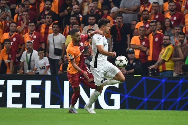 Hakim Ziyech (L) of Galatasaray and Filip Ugrinic (R)of Young Boys during the UEFA Champions League Play-Offs Second Leg match between Galatasaray and Young Boys at Rams Park Stadium in Istanbul , Turkey on August 27 , 2024. ( Photo by Seskimphoto ) Galatasaray v Young Boys - UEFA Champions League Play-Offs Second Leg 