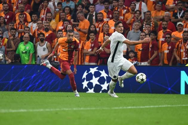 Hakim Ziyech (L) of Galatasaray and Filip Ugrinic (R)of Young Boys during the UEFA Champions League Play-Offs Second Leg match between Galatasaray and Young Boys at Rams Park Stadium in Istanbul , Turkey on August 27 , 2024. ( Photo by Seskimphoto ) Galatasaray v Young Boys - UEFA Champions League Play-Offs Second Leg 