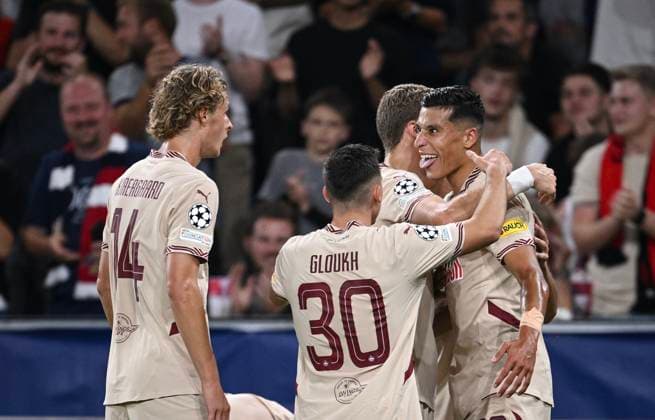 FOOTBALL Champions League qualification season 2024 2025 return match FC Salzburg Dynamo Kiev 27 08 2024 CHEERS FC Salzburg Maurits Kjaergaard, Oscar Gloukh, Ignace van der Brempt hugging goal scorer for 1 0 Adam Daghim from left