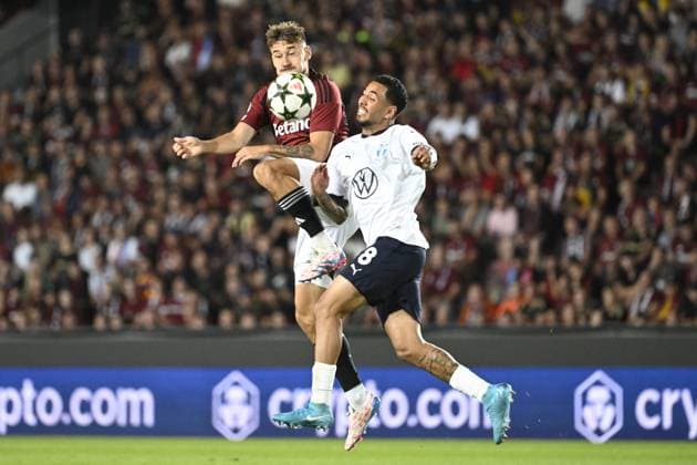 From left Matej Rynes of Sparta, Sergio Pena of Malmo in action during the Football Champions League 4th qualifying round Return match: Sparta Prague vs Malmo FF in Prague, Czech Republic, August 27, 2024. (CTKxPhoto KaterinaxSulova) CTKPhotoP2024082707477  CTKPhotoP2024082707477