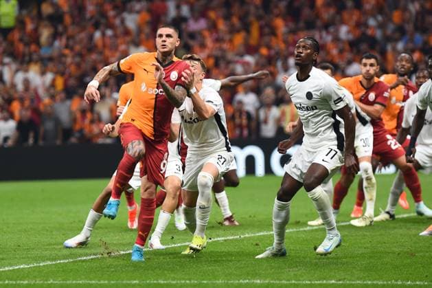 Mauro Icardi (9) of Galatasaray and Joel Monteiro (77) of Young Boys during the UEFA Champions League Play-Offs Second Leg match between Galatasaray and Young Boys at Rams Park Stadium in Istanbul , Turkey on August 27 , 2024. ( Photo by Seskimphoto ) Galatasaray v Young Boys - UEFA Champions League Play-Offs Second Leg 