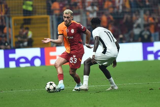 Baris Alper Yilmaz of Galatasaray and Ebrima Colley (11) of Young Boys during the UEFA Champions League Play-Offs Second Leg match between Galatasaray and Young Boys at Rams Park Stadium in Istanbul , Turkey on August 27 , 2024. ( Photo by Seskimphoto ) Galatasaray v Young Boys - UEFA Champions League Play-Offs Second Leg 