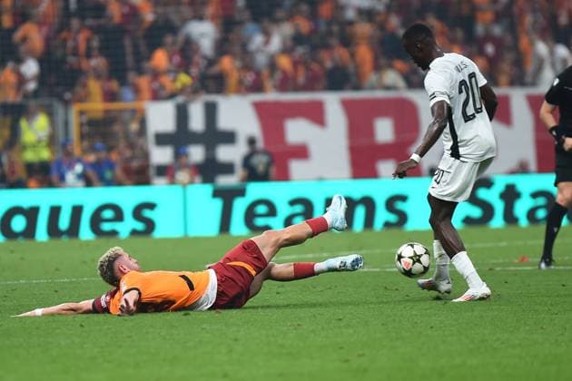 Baris Alper Yilmaz (L) of Galatasaray and Cheikh Niasse (20) of Young Boys during the UEFA Champions League Play-Offs Second Leg match between Galatasaray and Young Boys at Rams Park Stadium in Istanbul , Turkey on August 27 , 2024. ( Photo by Seskimphoto ) Galatasaray v Young Boys - UEFA Champions League Play-Offs Second Leg 